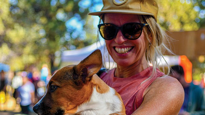 A race participant and her dog