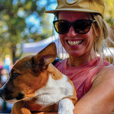 A race participant and her dog