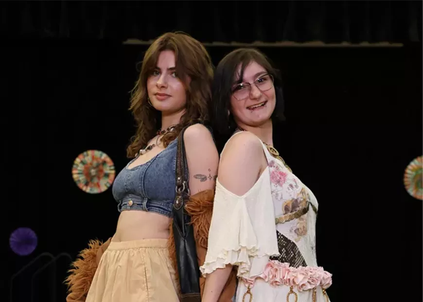 Students model secondhand looks at the Earth Day Fashion Show.