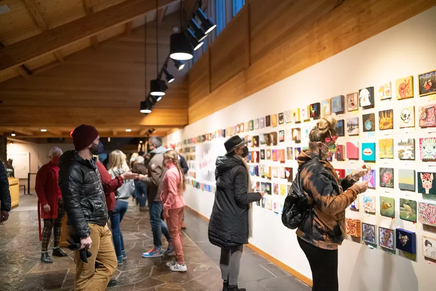 20-dollar-art-show-and-visitors.webp
