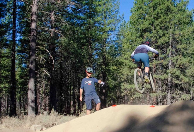 Learning how to jump with Grit Clinics Professional MTB Skills Instructor