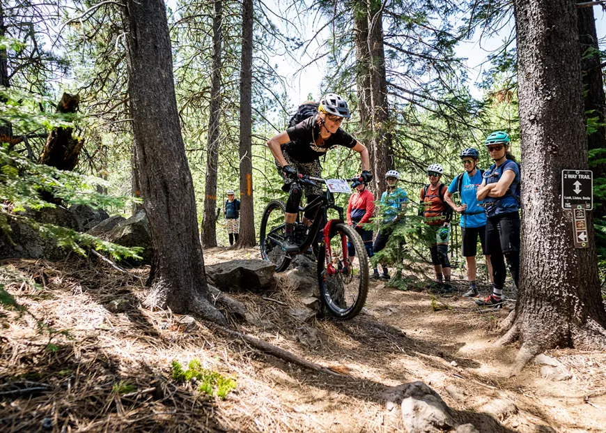 Coach Erika shows riders how to tackle the rocks in Bend