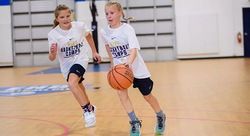 2-girls-playing-scrimmage_2024-04-03-210845_jqvc.webp