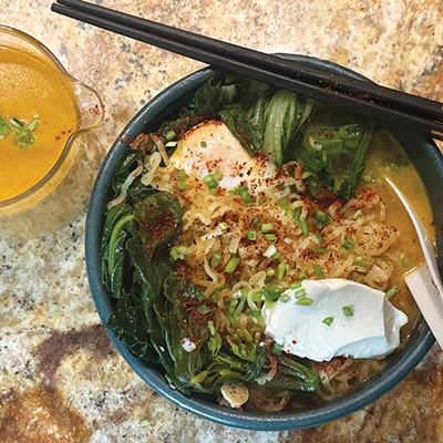 A bowl of ramen with an egg