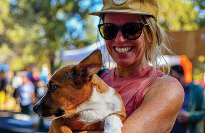 A race participant and her dog