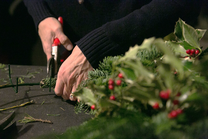 wreath_making_-_hand_with_holly.png